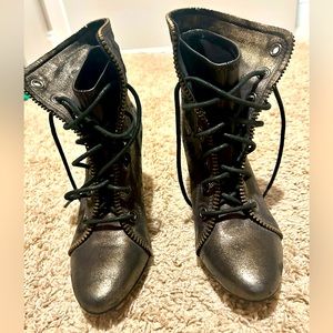 New without tags Coach lace up booties with heel.